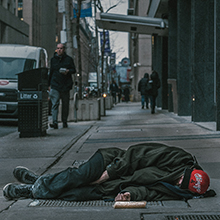 Homeless man on Sidewalk